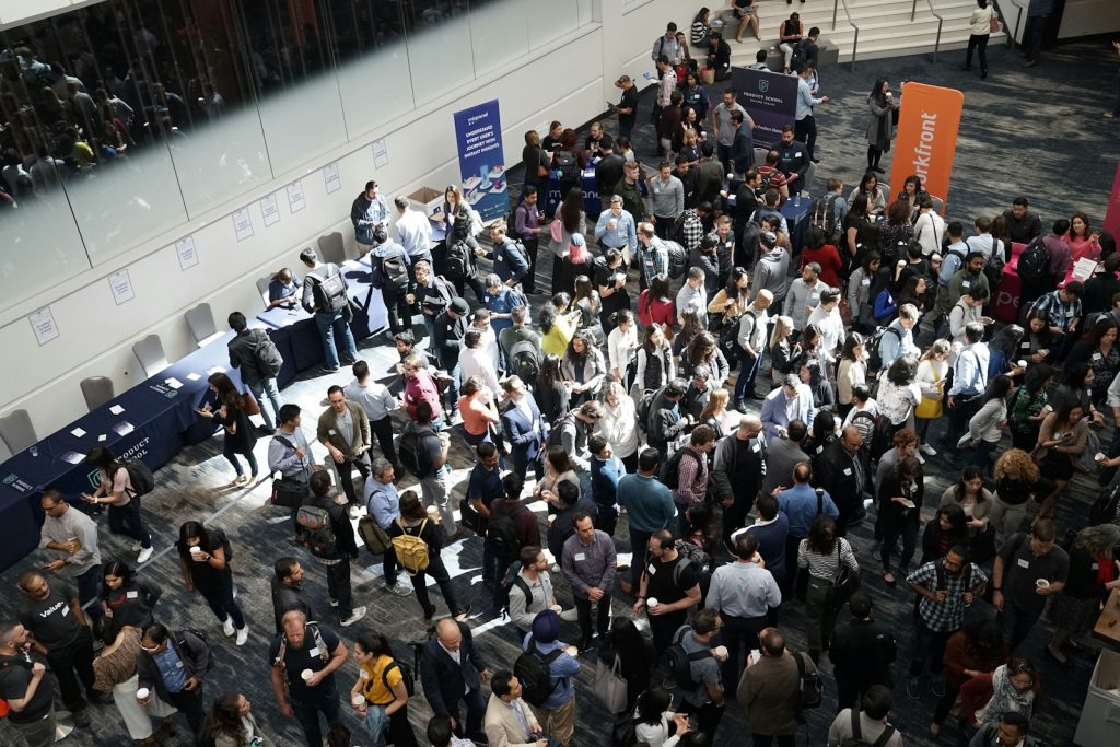 crowd of people in building lobby - NextStars